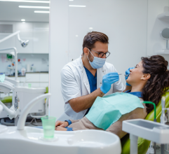 Picture of a dentist with a patient Picture of a dentist with a patient